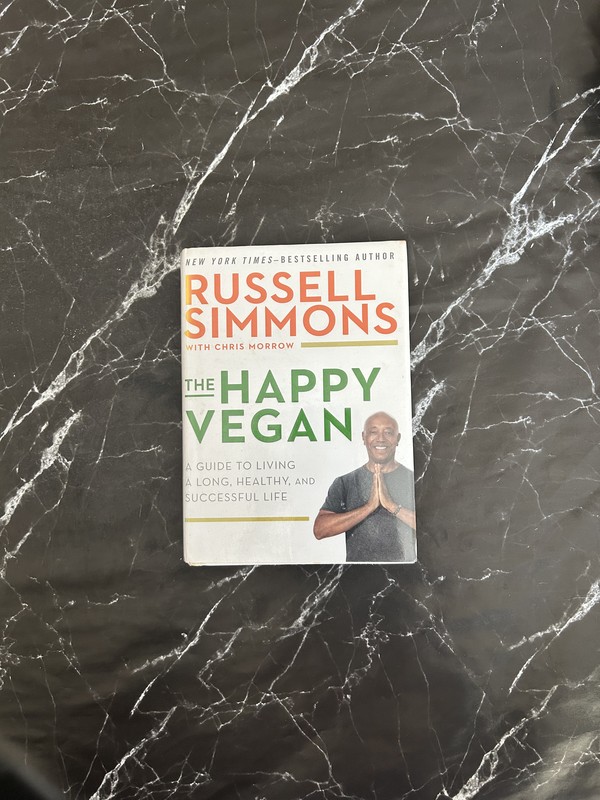 The Happy Vegan: A Guide to Living a Long, Healthy, and Successful Life cover